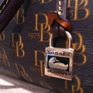 Dooney & Bourke 1975 DB Signature Bag- Interior - 1 zip pocket and 1 slit pocket